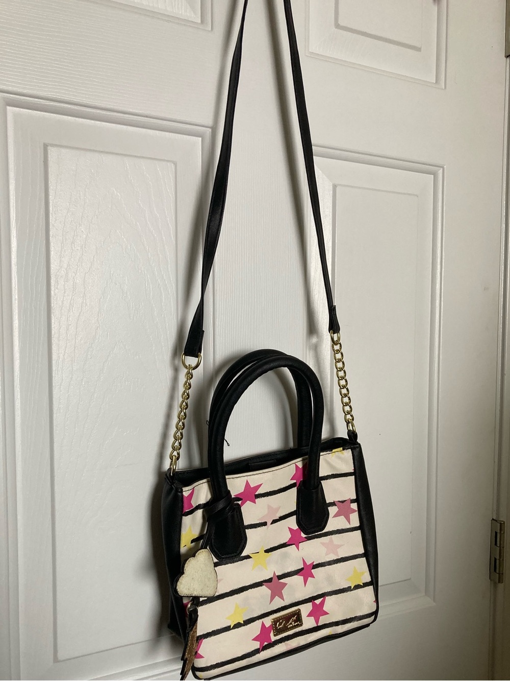 Betsey Johnson Black-Trim Cream Star Print Crossbody with Pink & Yellow Stars